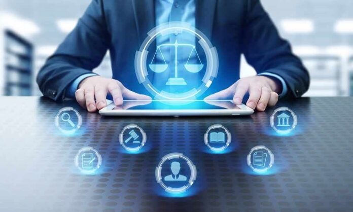 Businessperson using tablet with digital justice icons