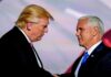 Donald Trump and Mike Pence shake hands on stage