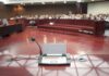 Grieving Dad Torches Conspiracy Frenzy Conference microphone on a podium in a courtroom