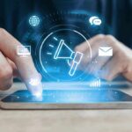 Hands using a smartphone with digital marketing icons overlay