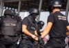 Customs officers in tactical gear during an operation