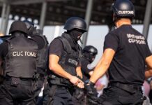 Customs officers in tactical gear during an operation