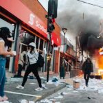 Marseille Meltdown: Viral Flame Attack Street protest with fire and smoke outside a bank