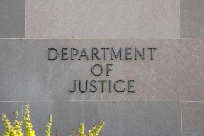 Department of Justice building sign on stone wall