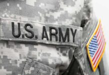 Fort Hood Killer to Face Army Firing Squad military uniform with embroidered name tape and flag patch