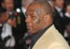Mike Tyson in profile at an event